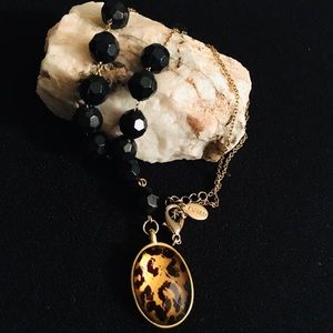 Express Gold tone black bead & tiger drop pendant